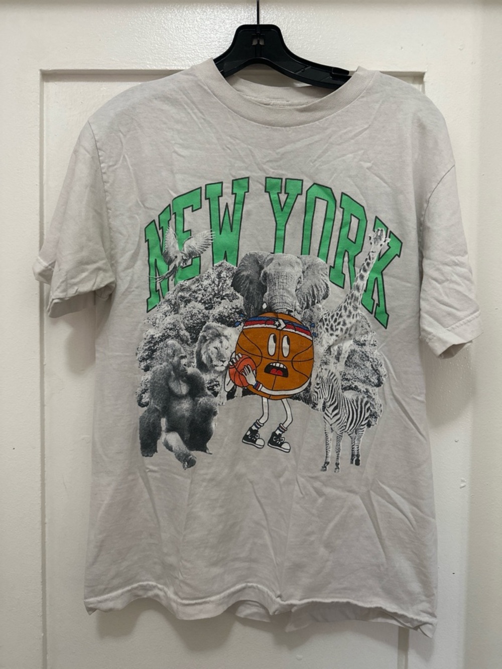 Chinatown Market New York Graphic Tee with Green Lettering